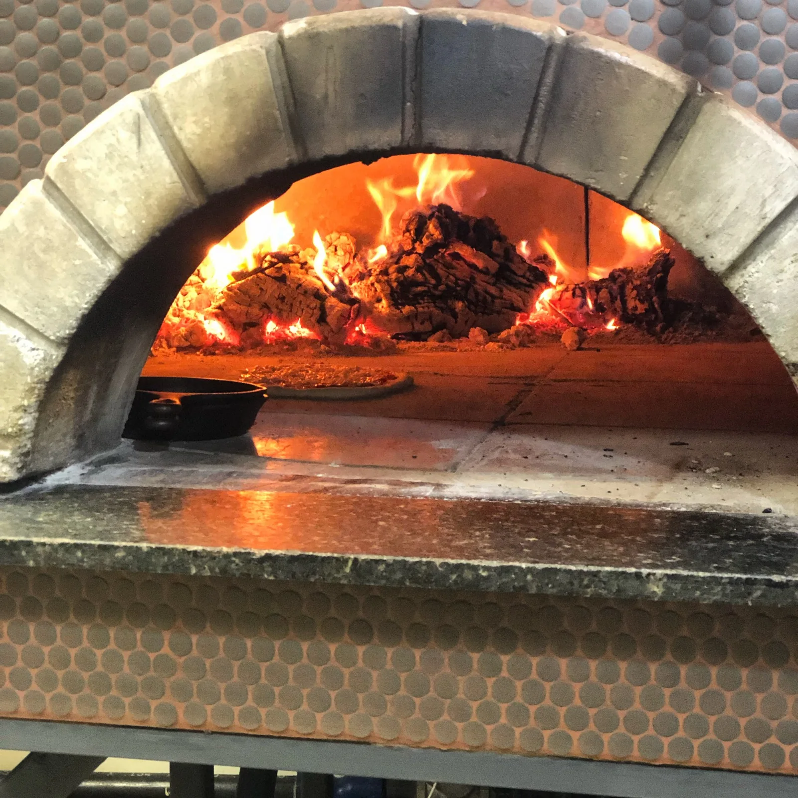 The wood-burning oven at Roots